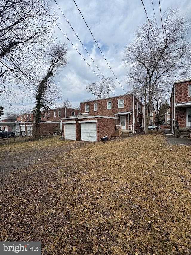 exterior space featuring brick siding