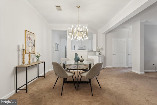 dining space with a chandelier, light colored carpet, ornamental molding, and baseboards