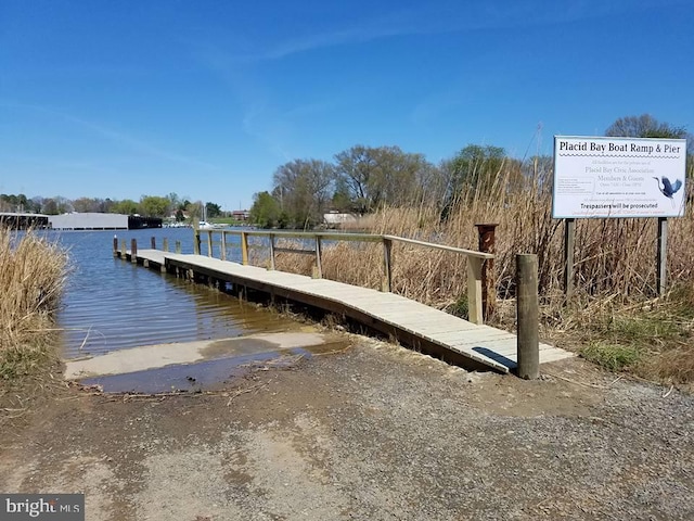 view of dock with a water view