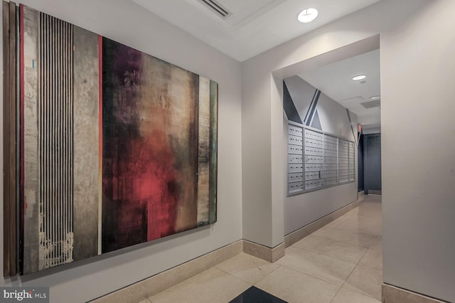 interior space with recessed lighting, mail area, baseboards, and tile patterned floors