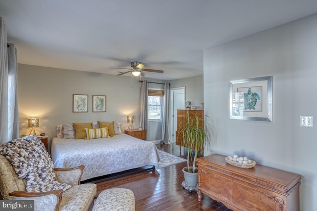 bedroom featuring dark wood finished floors and ceiling fan