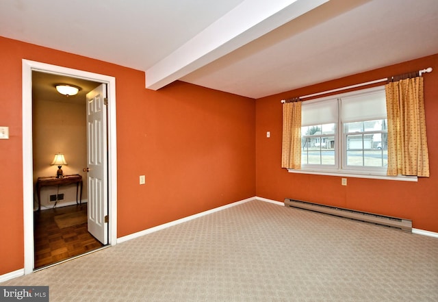 carpeted spare room with a baseboard radiator, baseboards, and beam ceiling