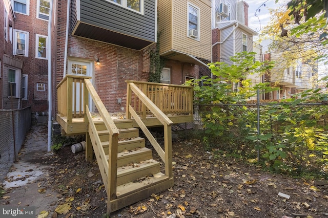 exterior space with fence and cooling unit