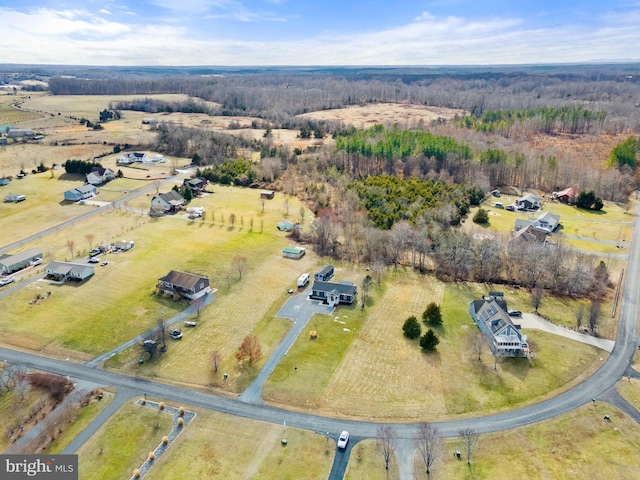 birds eye view of property featuring a rural view