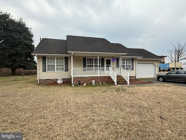 ranch-style house with a porch, a shingled roof, an attached garage, a front yard, and crawl space