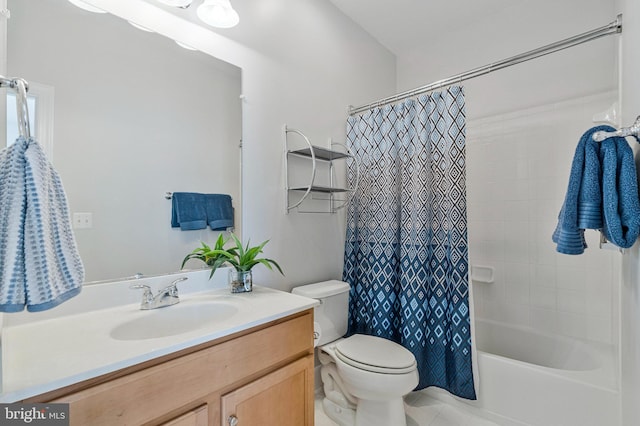 bathroom featuring shower / bath combo with shower curtain, toilet, and vanity