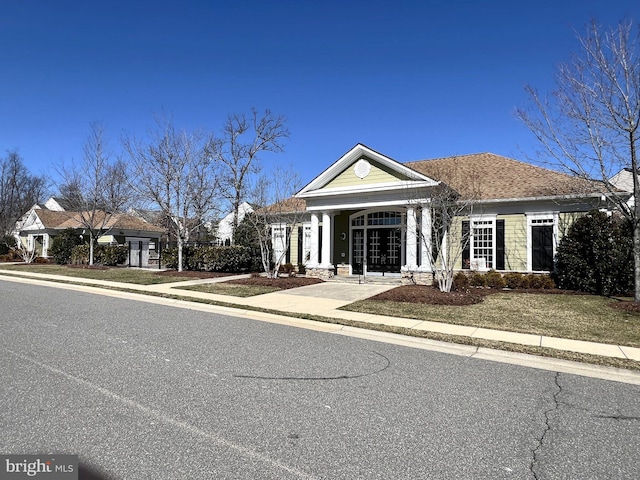 view of greek revival inspired property