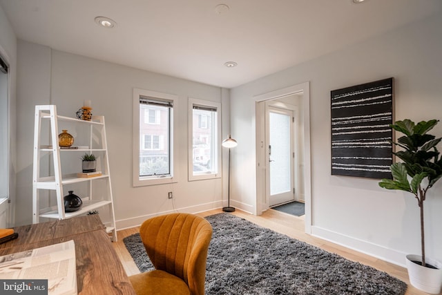 home office featuring recessed lighting, wood finished floors, and baseboards