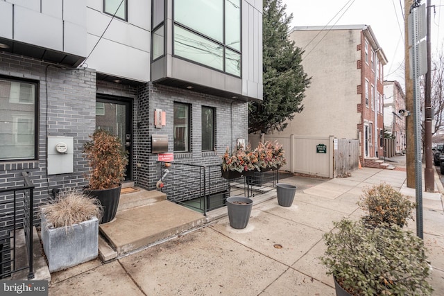 view of patio featuring fence