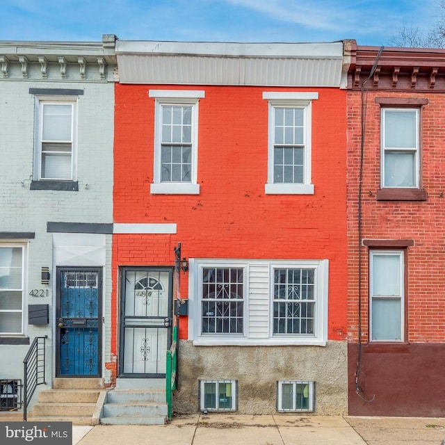 multi unit property featuring brick siding