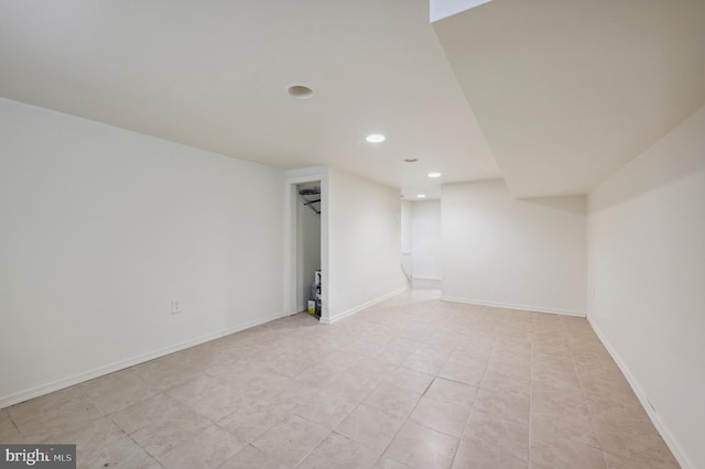 finished below grade area with recessed lighting and baseboards