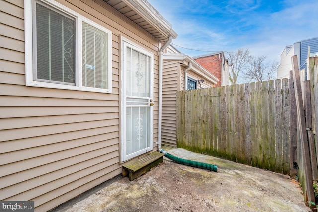 property entrance with fence