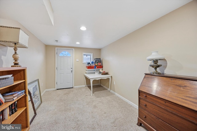 carpeted foyer featuring recessed lighting and baseboards