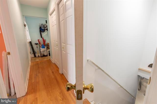 hallway featuring light wood-style floors