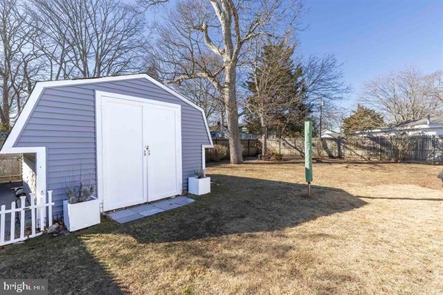 view of shed featuring a fenced backyard