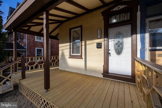 entrance to property with a porch