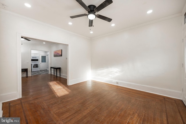 empty room with crown molding, recessed lighting, ceiling fan, wood finished floors, and baseboards