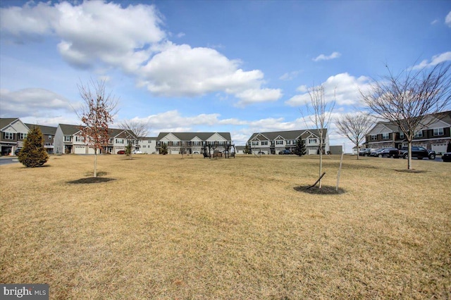 view of yard with a residential view