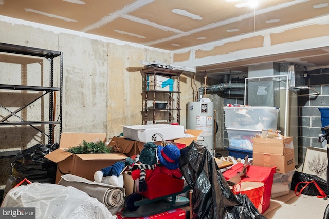 storage room featuring water heater