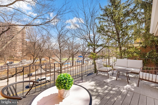 deck featuring an outdoor living space