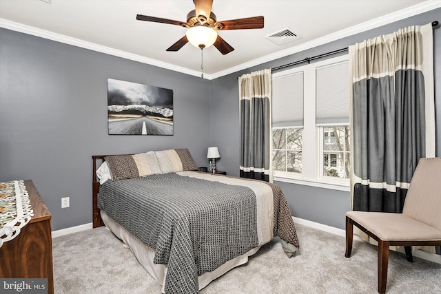 carpeted bedroom with ornamental molding, a ceiling fan, visible vents, and baseboards