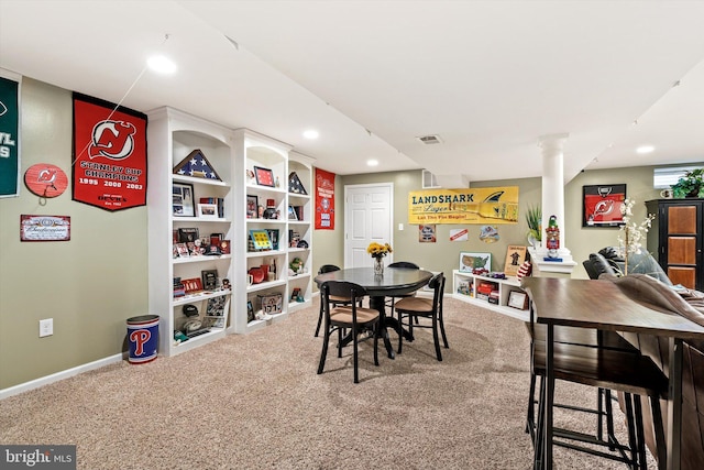 carpeted dining space with recessed lighting, visible vents, and baseboards