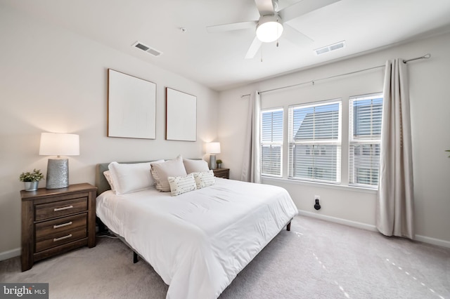 bedroom featuring visible vents and baseboards