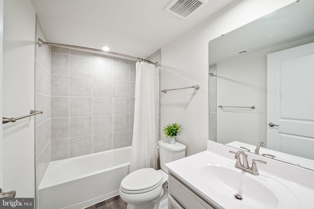 full bathroom featuring vanity, toilet, shower / bath combo, and visible vents