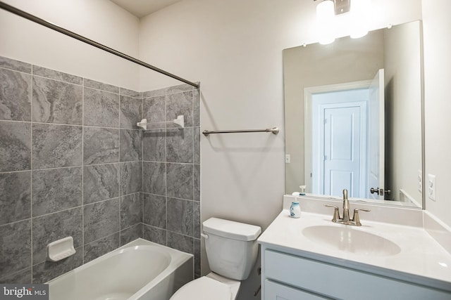 bathroom with toilet, shower / bathtub combination, and vanity