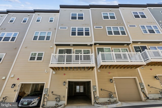 view of building exterior featuring a garage