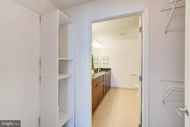 bathroom featuring toilet and vanity