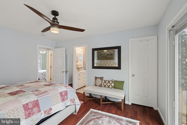 bedroom with connected bathroom, baseboards, wood finished floors, and a ceiling fan