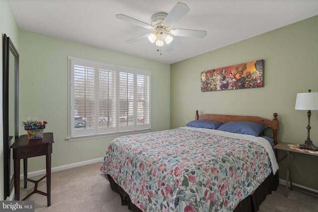 bedroom with carpet, baseboards, and ceiling fan