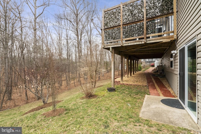 view of yard with a deck