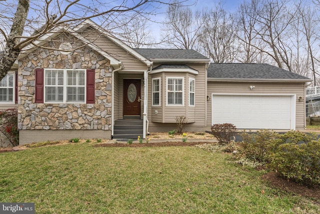 ranch-style home featuring a front yard, a garage, stone siding, and roof with shingles