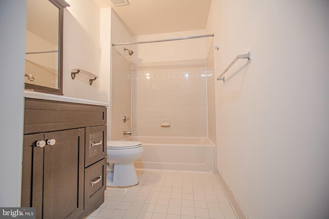 full bathroom with tile patterned flooring, toilet, vanity, baseboards, and washtub / shower combination