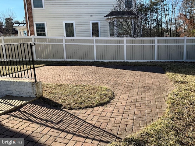 exterior space with a fenced backyard