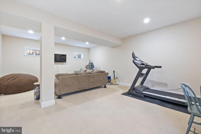 exercise area with carpet flooring, recessed lighting, and baseboards