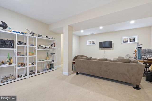 living area with recessed lighting, baseboards, and carpet floors