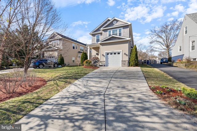 view of front of property featuring concrete driveway, an attached garage, a front yard, and stone siding