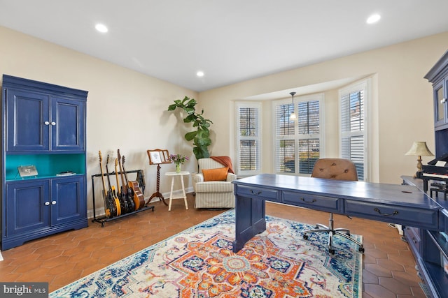 office featuring tile patterned floors, baseboards, and recessed lighting