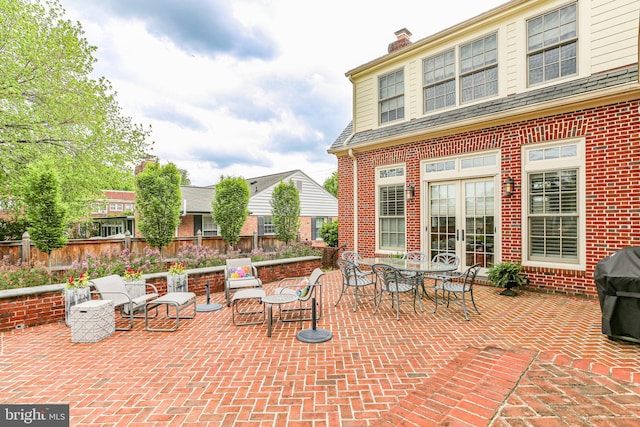 809 Cornell St, Fredericksburg, VA 22401 - view of patio featuring grilling area, fence, and french doors