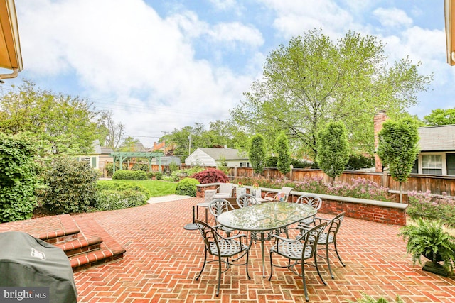 809 Cornell St, Fredericksburg, VA 22401 - view of patio featuring outdoor dining area and a fenced backyard