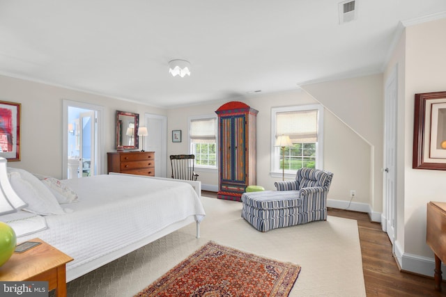 809 Cornell St, Fredericksburg, VA 22401 - bedroom featuring crown molding, baseboards, wood finished floors, and visible vents