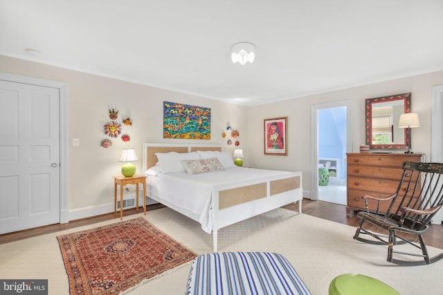 809 Cornell St, Fredericksburg, VA 22401 - bedroom with baseboards, wood finished floors, and visible vents