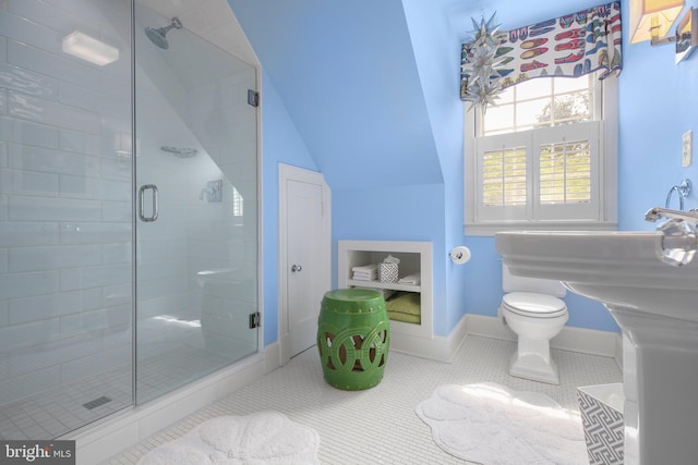 809 Cornell St, Fredericksburg, VA 22401 - full bath with tile patterned flooring, toilet, baseboards, a shower stall, and vaulted ceiling