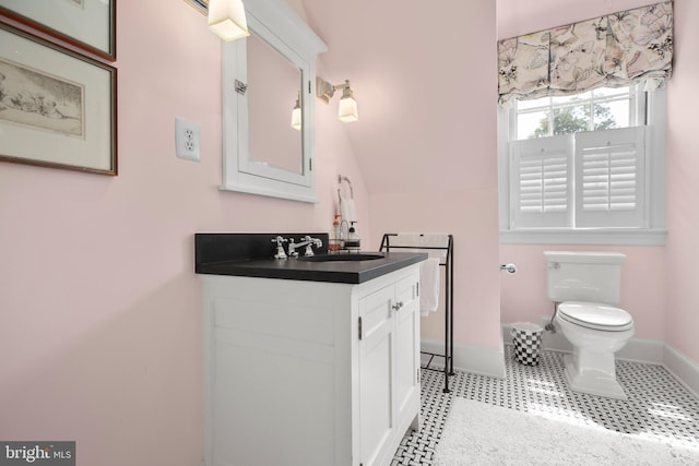 809 Cornell St, Fredericksburg, VA 22401 - half bath featuring baseboards, toilet, and vanity