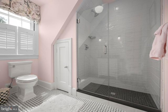 809 Cornell St, Fredericksburg, VA 22401 - bathroom with toilet, baseboards, tile patterned floors, and a stall shower