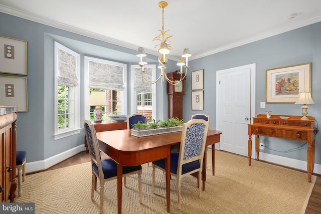 809 Cornell St, Fredericksburg, VA 22401 - dining room with baseboards, ornamental molding, wood finished floors, and a chandelier