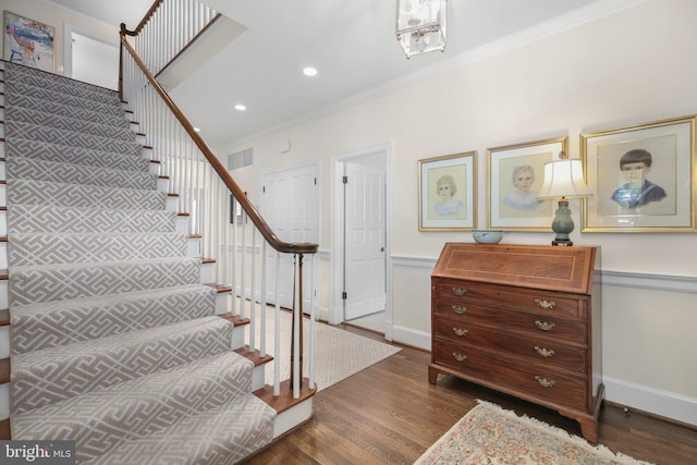 809 Cornell St, Fredericksburg, VA 22401 - staircase with visible vents, ornamental molding, baseboards, and wood finished floors